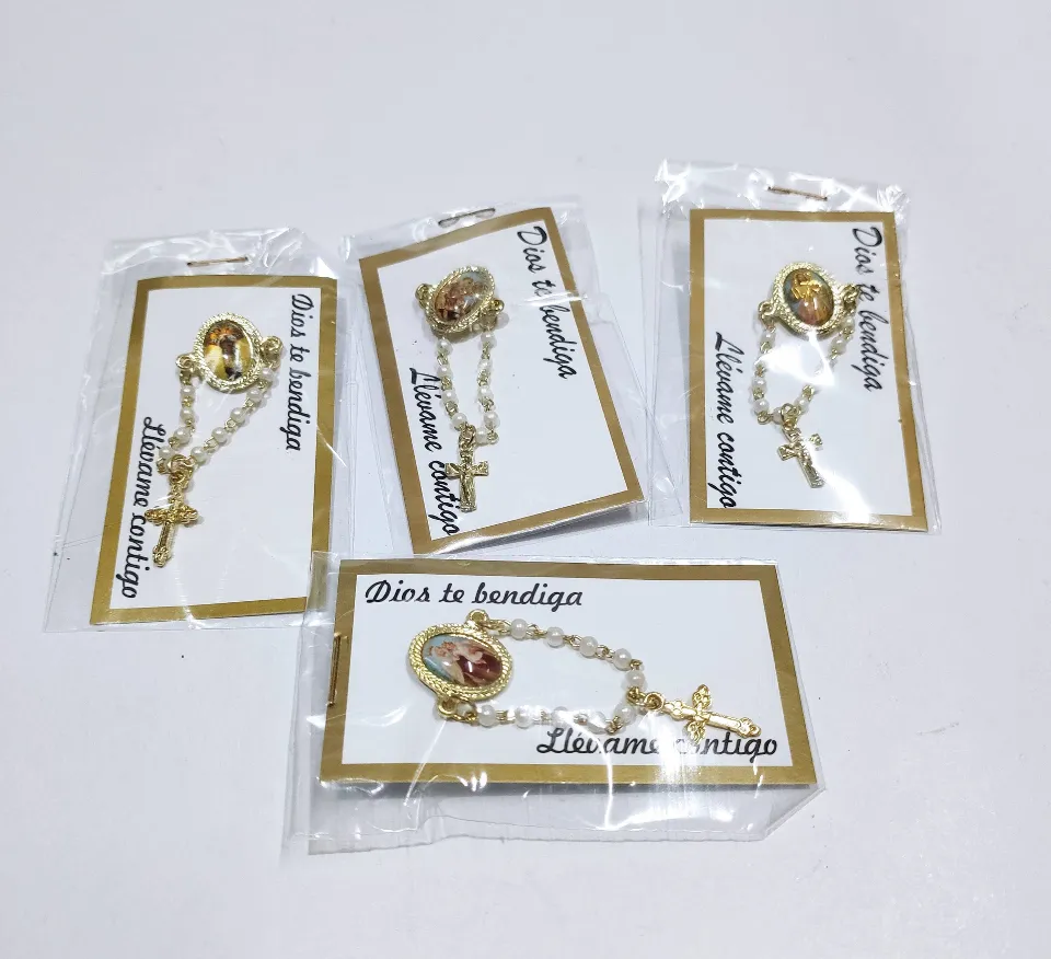 Prendedores o broches Católicos