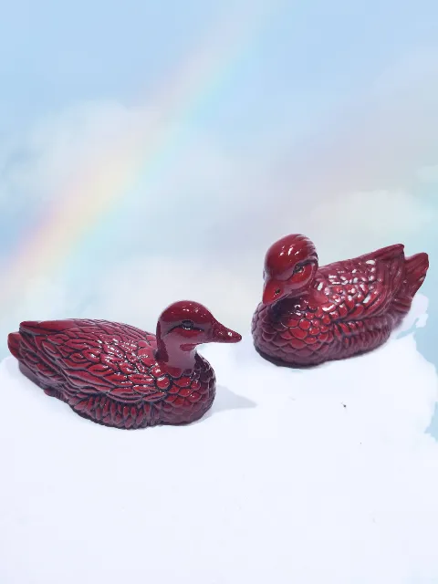 Estatuillas de Patos